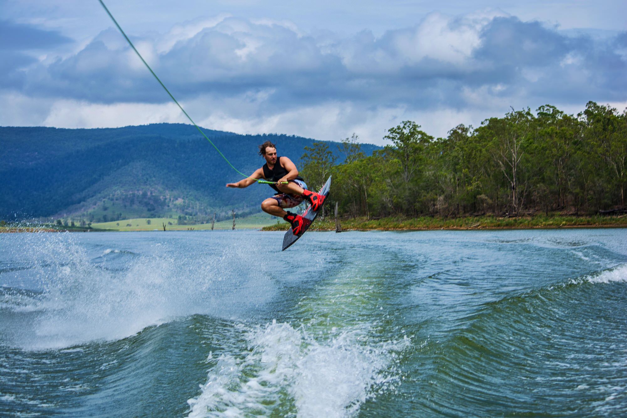 Do a wakeboard trick McKenzie Sue Makes